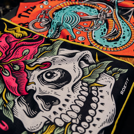 Close up of Utility Towels with 'Eternal Bloom' and 'Prepare For The Unknown' graphic