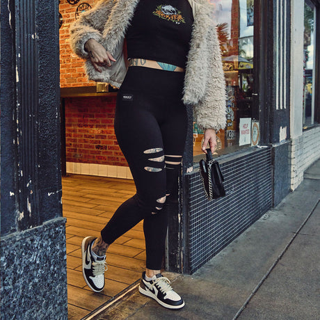 Female model outdoors wearing Cutline Leggings