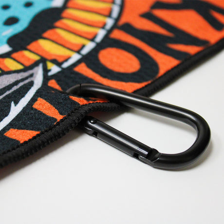 Close up of Utility Towel black carabiner clip with 'Prepare For The Unknown' graphic